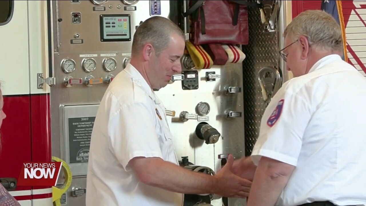 Bath Township Fire Chief, Joe Kitchen, swears in Brock Yingling as Platoon Chief along with Nine new firefighters